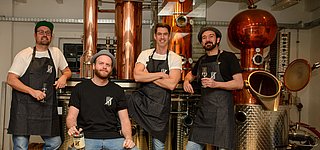 Foto der vier Teammitglieder der Veedel Distillers