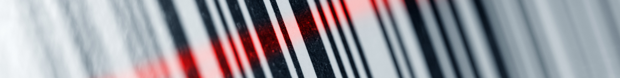 Strichcode mit GTIN wird von rotem Laserscanner ausgelesen
